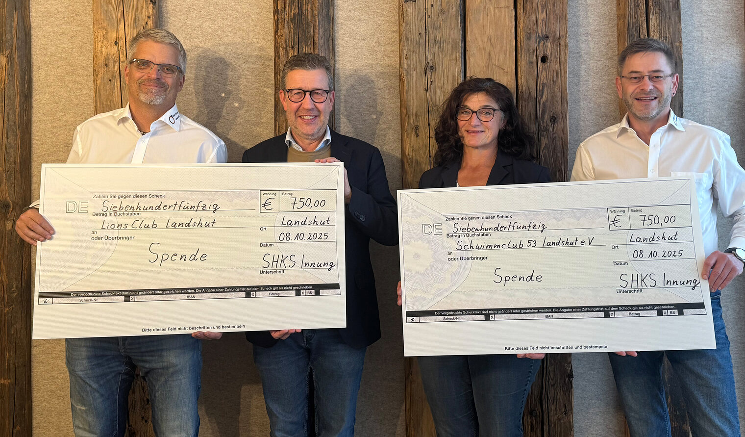 Die Innung übergab im Rahmen ihrer 100-Jahre-Jubiläumsfeier zwei Spenden-Schecks im Wert von je 750 Euro für wohltätige Zwecke.